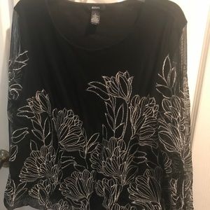 Dressy blouse with sheer sleeves